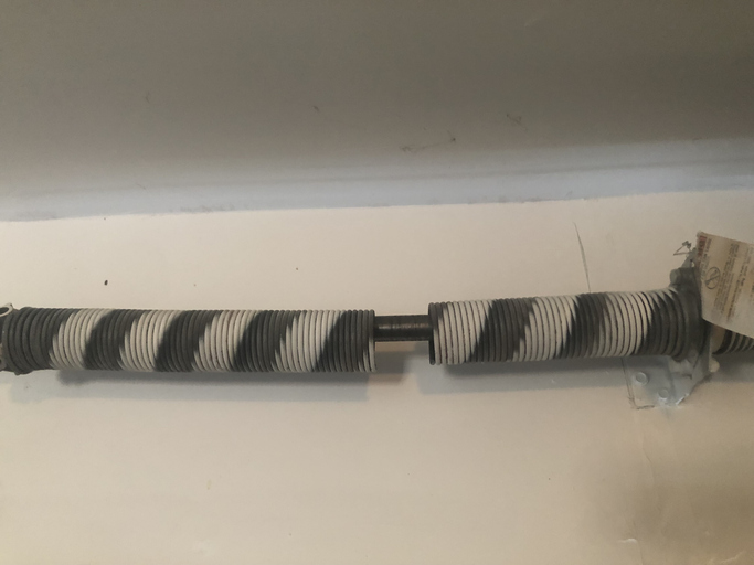 broken garage door spring