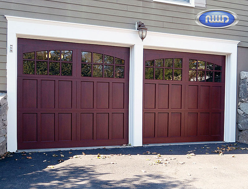 2 Brown Garage doors on a home